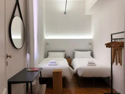 Letto o letti in una camera di Art Apartments