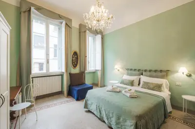 Letto o letti in una camera di B&B Beatrice