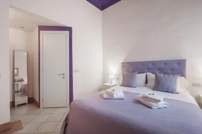 Letto o letti in una camera di B&B Beatrice