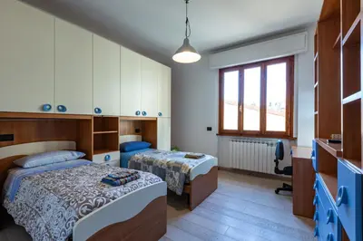 Letto o letti in una camera di Accogliente casa a Pontassieve