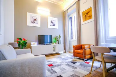 TV o dispositivi per l'intrattenimento presso Dolcevita Boutique Apartment