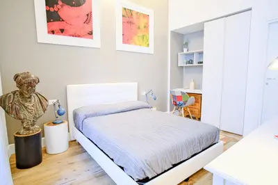 Letto o letti in una camera di Dolcevita Boutique Apartment