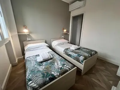 Letto o letti in una camera di Leonardo luxury apartment