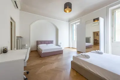 Letto o letti in una camera di [5 min Duomo] Magnificent Home