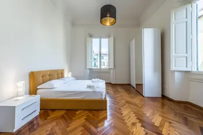 Letto o letti in una camera di [5 min Duomo] Magnificent Home