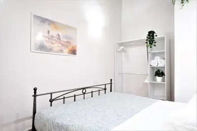 Letto o letti in una camera di Wine Apartments Florence Ribolla