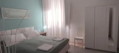 Letto o letti in una camera di Flowerence