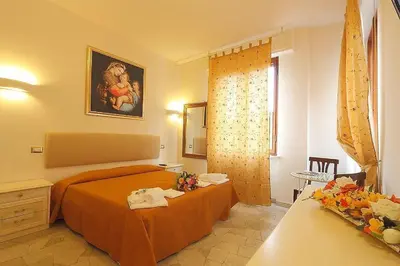 Letto o letti in una camera di Arcadia GuestHouse
