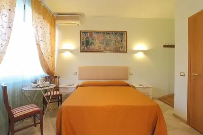 Letto o letti in una camera di Arcadia GuestHouse