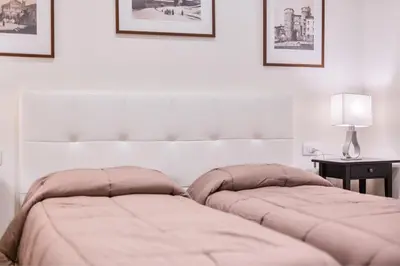 Letto o letti in una camera di Federighi by Mmega