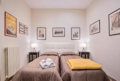 Letto o letti in una camera di Federighi by Mmega