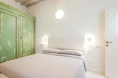 Letto o letti in una camera di Happy Florence Ghibellina
