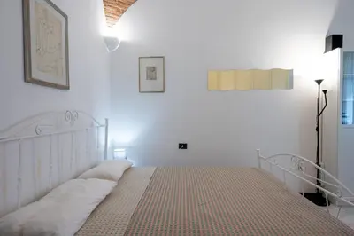 Letto o letti in una camera di Casa dei Renai by Rentbeat