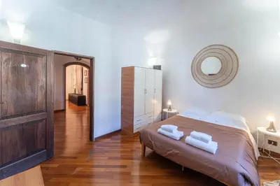 Letto o letti in una camera di Tora Florence Apartment - Room rent