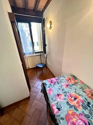 Letto o letti in una camera di Heart of Florence Duomo Charming and Cozy Apartment