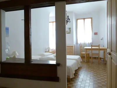 Letto o letti in una camera di Natural Home