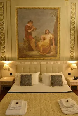 Letto o letti in una camera di Palazzo Guicciardini