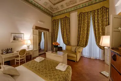 Letto o letti in una camera di Palazzo Guicciardini
