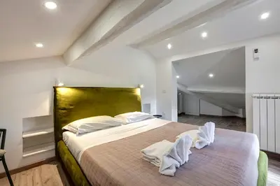 Letto o letti in una camera di Micheli Apartment