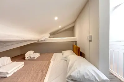 Letto o letti in una camera di Micheli Apartment