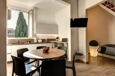 Area soggiorno di Micheli Apartment