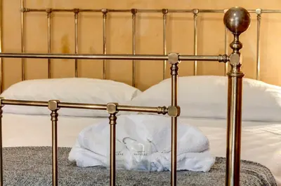 Letto o letti in una camera di Dafne Apartment by Mamo Florence