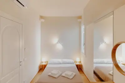 Letto o letti in una camera di Duomo - Camere matrimoniali con bagno privato