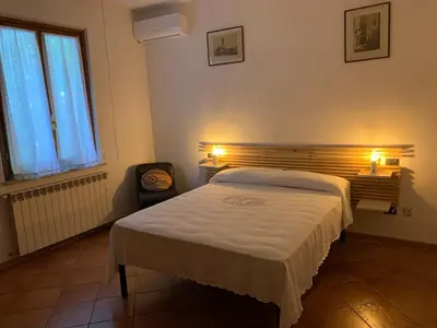 Letto o letti in una camera di Villino Dragonfly