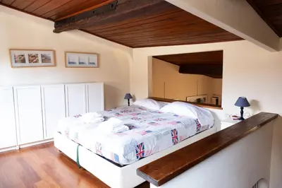 Letto o letti in una camera di Appartamento al Duomo