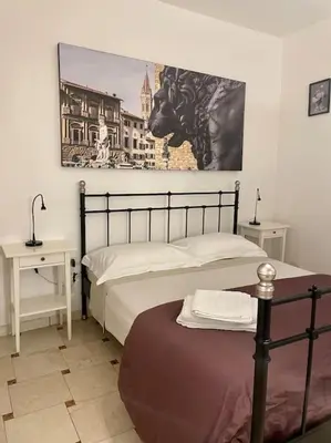 Letto o letti in una camera di Appartamento San Niccoló GR