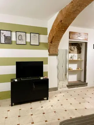 TV o dispositivi per l'intrattenimento presso Appartamento San Niccoló GR