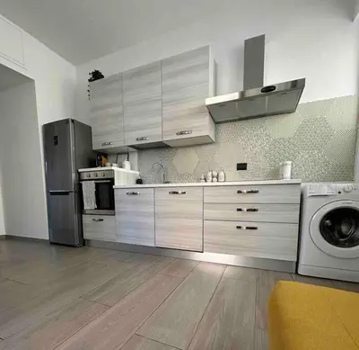 Cucina o angolo cottura di Niccolò Apartment - Firenze facilità di parcheggio