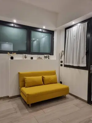 Area soggiorno di Niccolò Apartment - Firenze facilità di parcheggio