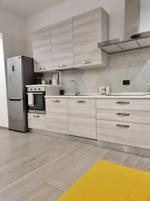 Cucina o angolo cottura di Niccolò Apartment - Firenze facilità di parcheggio