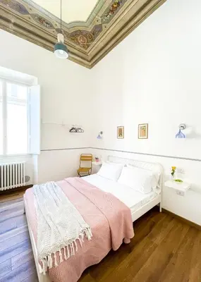 Letto o letti in una camera di Banchi
