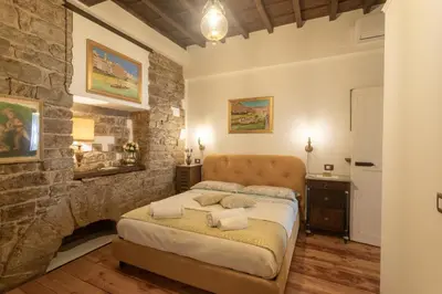 Letto o letti in una camera di Boutique Ponte Vecchio