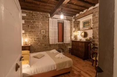 Letto o letti in una camera di Boutique Ponte Vecchio