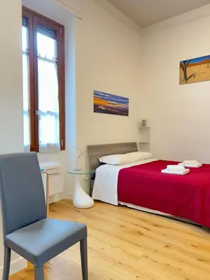 Letto o letti in una camera di FortVince Loft residential by FlorenceHospitality com