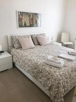 Letto o letti in una camera di Dolce Dimora