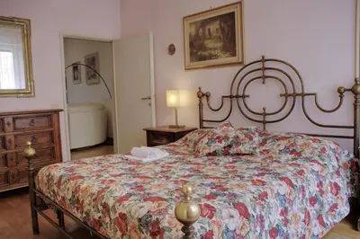 Letto o letti in una camera di Grandma`s House