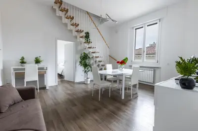 Area soggiorno di Cavour Florence Apartment