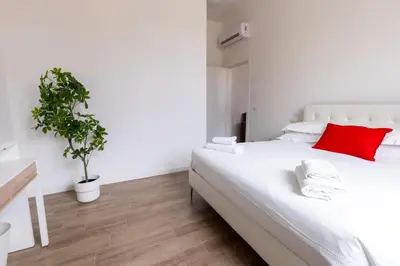 Letto o letti in una camera di Cavour Florence Apartment