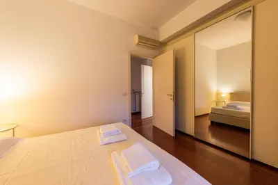 Letto o letti in una camera di Scipione by Mmega