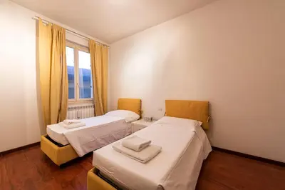 Letto o letti in una camera di Scipione by Mmega
