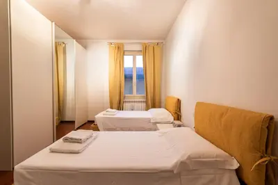 Letto o letti in una camera di Scipione by Mmega