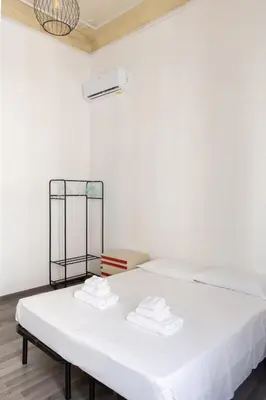Letto o letti in una camera di Big Apartment Outside Ztl Zone