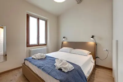 Letto o letti in una camera di Santa Reparata Apartment by Mamo Florence