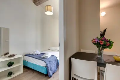 Letto o letti in una camera di Santa Reparata Apartment by Mamo Florence