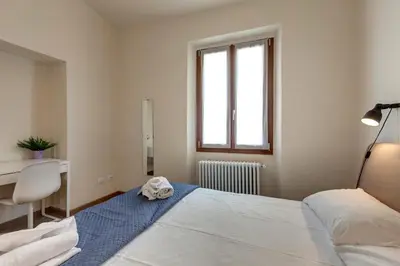 Letto o letti in una camera di Santa Reparata Apartment by Mamo Florence