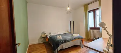 Letto o letti in una camera di Aretina Florence Villa